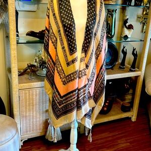 This is a Jessica Mc Clintock vest can be worn with jeans